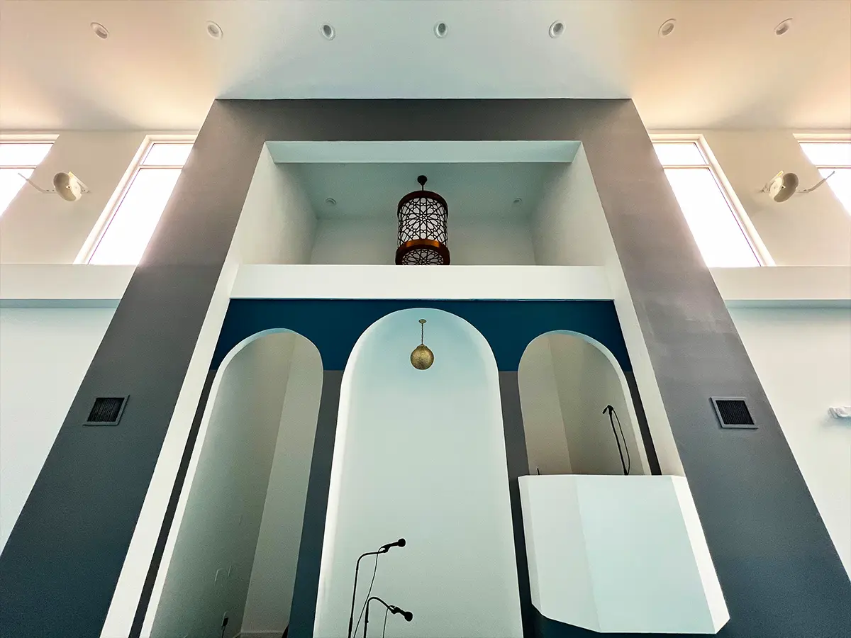 Prayer niche (mihrab) with arches and modern decorative elements - Featuring a clean, modern mosque design with traditional Islamic architecture influences.